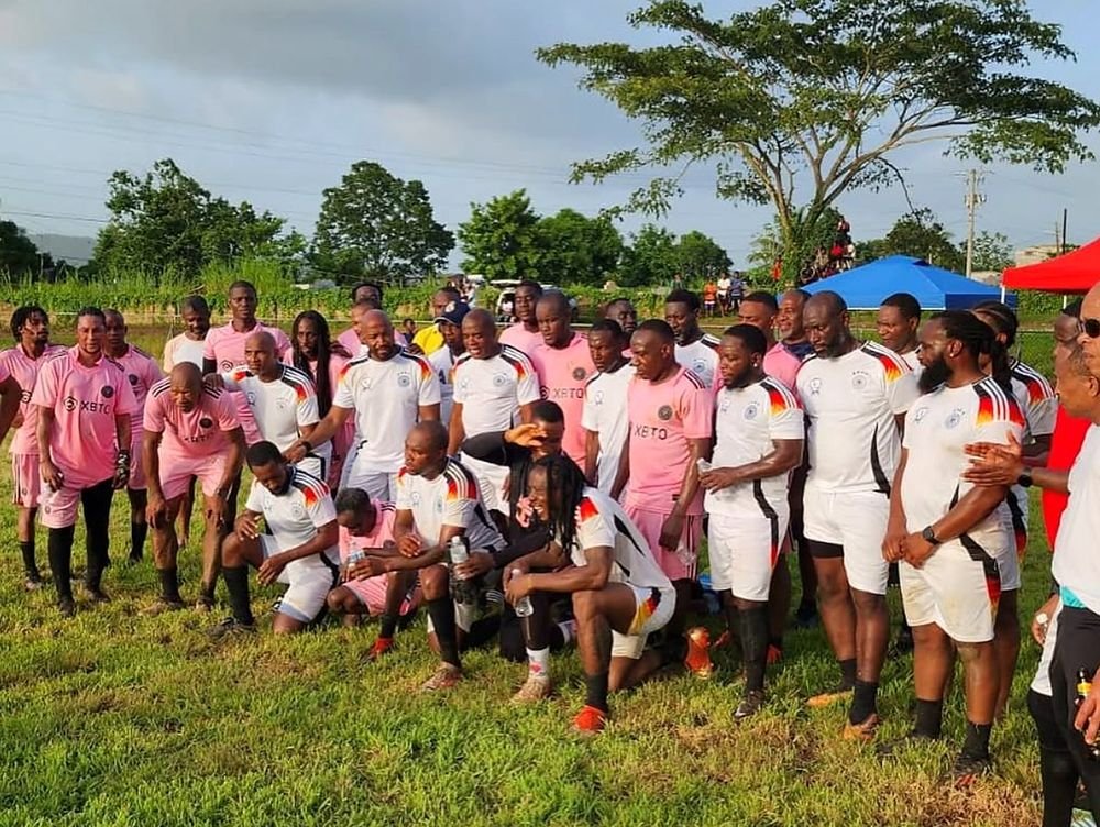 Cariblanta soccer players in pink and white kits after a match